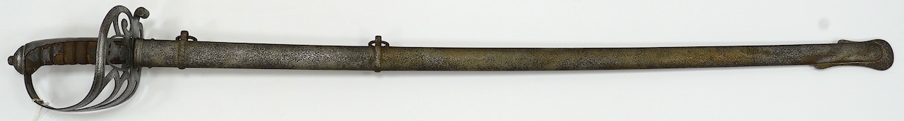 An 1827 pattern Victorian Rifle Officer’s sword, the blade etched with crowned VR and bugle, regulation hilt and scabbard, blade 82.5cm. Condition - poor